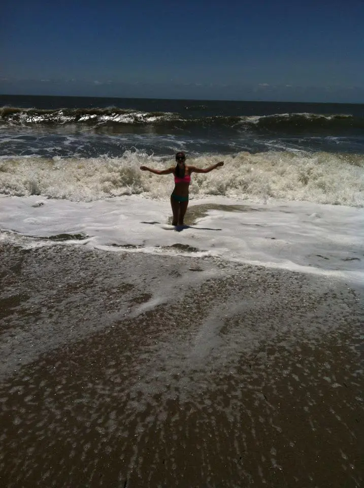 Person wading along the shoreline at Botany Bay beach on Edisto Island