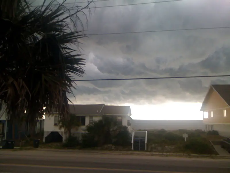 Dark storm clouds building over beachfront houses on Edisto Beach