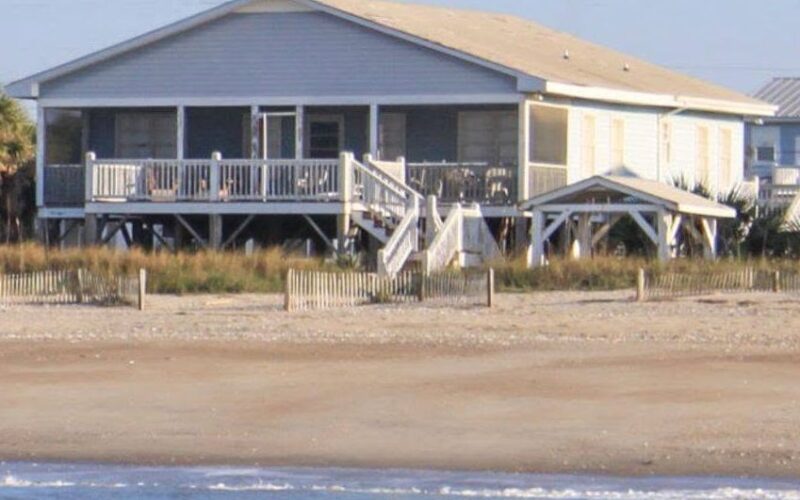 Raised oceanfront rental house behind the dunes on Edisto Beach